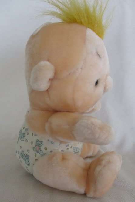A RATHER DIFFERENT PLUSH BABY DOLL