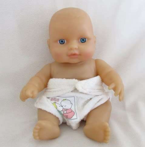 A VERY COLLECTABLE SMALL SUM SUM ANATOMICALLY CORRECT BABY DOLL WITH TWO CUTE FRONT TEETH!