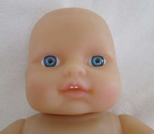A VERY COLLECTABLE SMALL SUM SUM ANATOMICALLY CORRECT BABY DOLL WITH TWO CUTE FRONT TEETH!