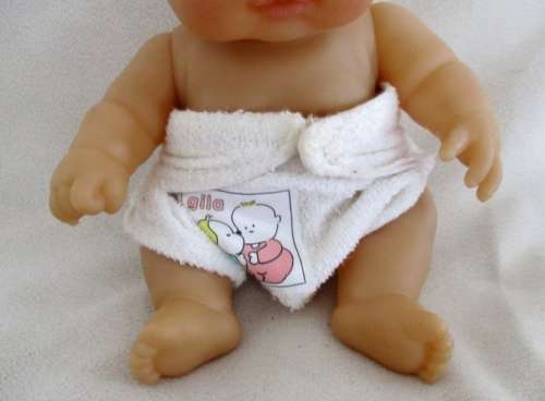 A VERY COLLECTABLE SMALL SUM SUM ANATOMICALLY CORRECT BABY DOLL WITH TWO CUTE FRONT TEETH!