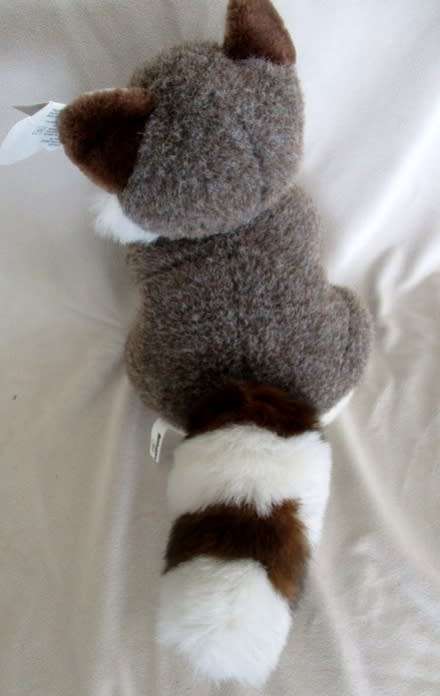 A VERY WELL MADE ALTHANS CLUB, GERMANY RACCOON WITH  QUALITATS-ZERTIFIKAT TAG AND ORIGINAL CHEST TAG