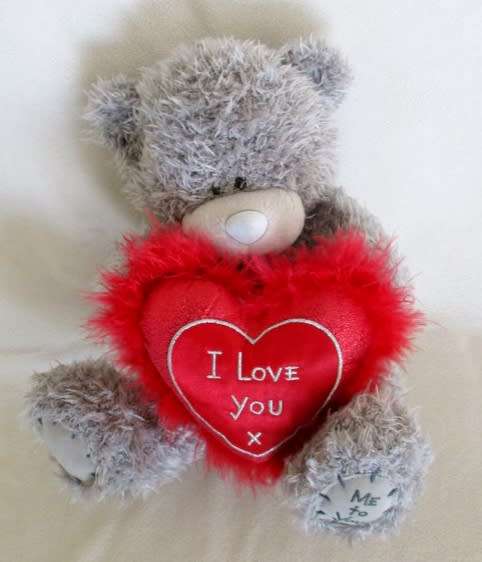 A LARGER TATTY TEDDY  (ME TO YOU) - HOLDING A PRETTY 'I LOVE YOU' PILLOW