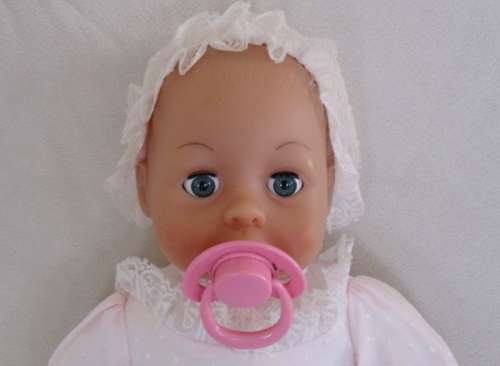 A VERY COLLECTABLE CRYING, GURGLING, COOING BATTAT BABY DOLL WITH OPEN/CLOSE EYES