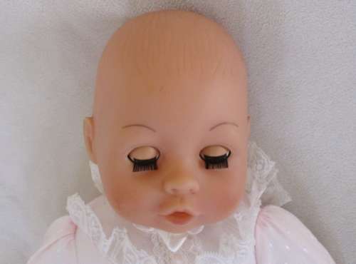 A VERY COLLECTABLE CRYING, GURGLING, COOING BATTAT BABY DOLL WITH OPEN/CLOSE EYES