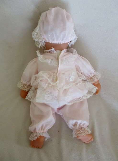 A VERY COLLECTABLE CRYING, GURGLING, COOING BATTAT BABY DOLL WITH OPEN/CLOSE EYES