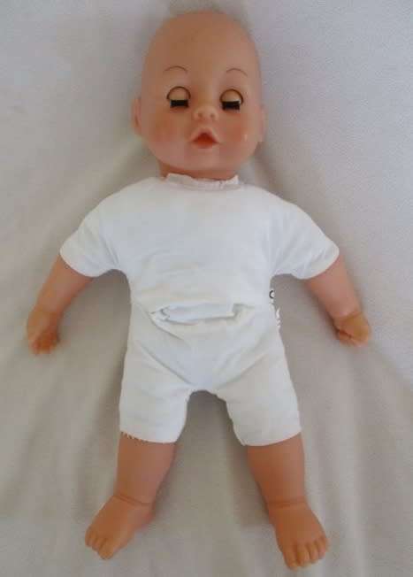 A VERY COLLECTABLE CRYING, GURGLING, COOING BATTAT BABY DOLL WITH OPEN/CLOSE EYES