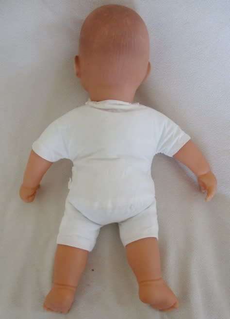 A VERY COLLECTABLE CRYING, GURGLING, COOING BATTAT BABY DOLL WITH OPEN/CLOSE EYES
