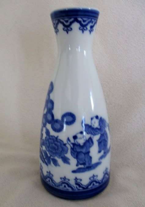 CHARMING BLUE AND WHITE PORCELAIN SAKE DECANTER DEPICTING CHILDREN PLAYING - SIGNED ON BASE