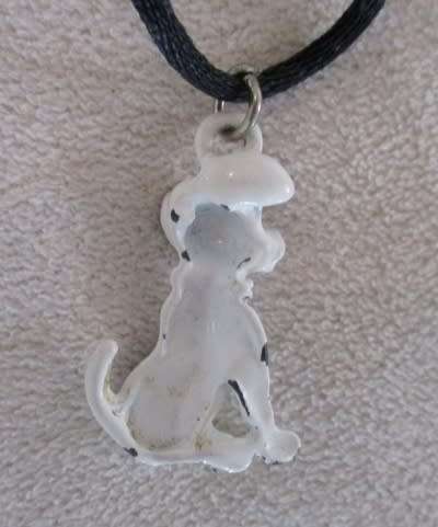 A VINTAGE PAINTED METAL DALMATIAN TO WEAR AS NECKLACE OR ADD TO YOUR CHARM BRACELET
