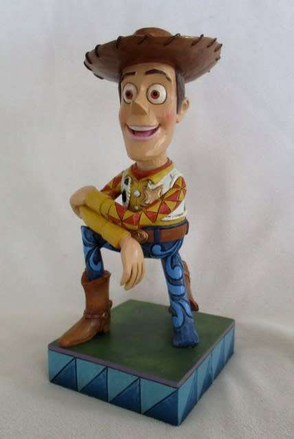 HIGHLY COLLECTABLE JIM SHORE FOR ENESCO - WOODY FROM DISNEY'S TOY STORY - HOWDY PARTNER (RETIRED)