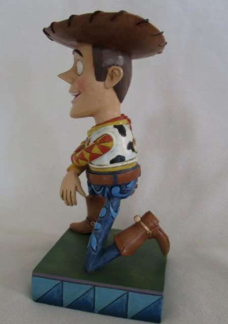 HIGHLY COLLECTABLE JIM SHORE FOR ENESCO - WOODY FROM DISNEY'S TOY STORY - HOWDY PARTNER (RETIRED)