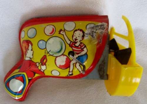 A VERY OLD VINTAGE 1940's/50's BURROUGHS TIN PLATE MECHANICAL BUBBLE GUN IN NEED OF TLC