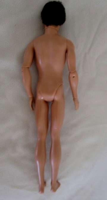 BARBIE - A STUNNING DARK HAIRED MATTEL KEN DOLL WITH ARTICULATED ELBOWS AND WRISTS