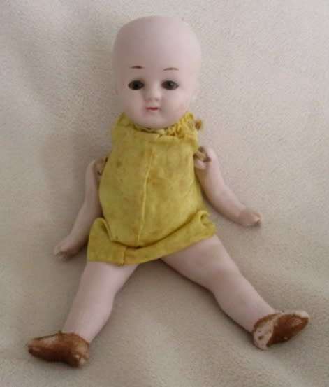STRAIGHT OUT OF THE ATTIC - AN ANTIQUE GERMAN BISQUE DOLL WITH OPEN/CLOSE EYES  TO RESTORE!!