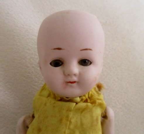 STRAIGHT OUT OF THE ATTIC - AN ANTIQUE GERMAN BISQUE DOLL WITH OPEN/CLOSE EYES  TO RESTORE!!