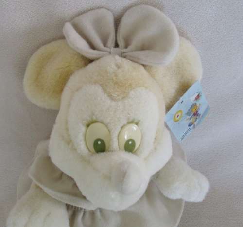 A RATHER DIFFERENT LAURANA MINNIE MOUSE IN SHADES OF CREAM