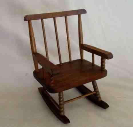 A LOVELY WOODEN ROCKING CHAIR FOR BARBIE SIZE DOLL OR SMALL BEAR