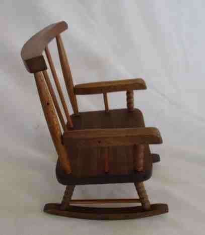 A LOVELY WOODEN ROCKING CHAIR FOR BARBIE SIZE DOLL OR SMALL BEAR