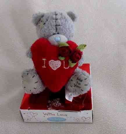 A TINY TATTY TEDDY  (ME TO YOU) STILL MOUNTED ON ORIGINAL BOX