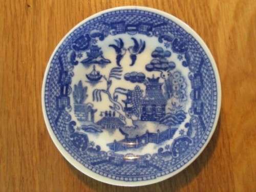 FOUR DIFFERENT-SIZED BLUE AND WHITE WILLOW PATTERN PLATES (TWO MARKED JAPAN) - NICE DISPLAY!