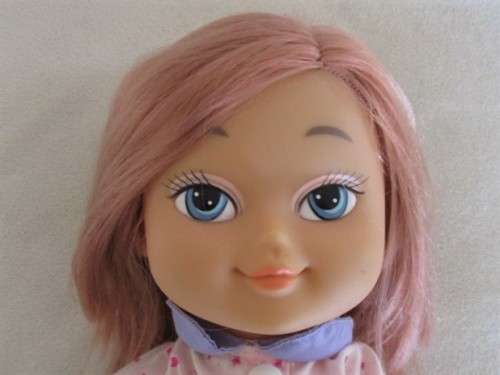 A CUTE SOFT BODIED LUCKY IND. DOLL WITH BRATZ-LIKE EYES AND A CHEEKY SMILE