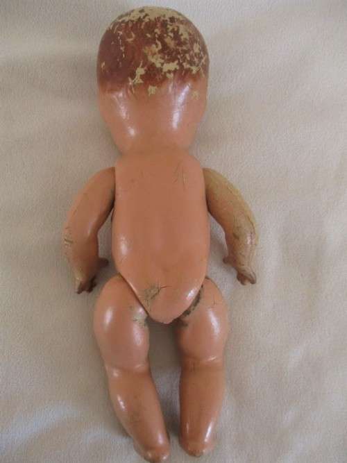 STRAIGHT OUT OF THE ATTIC - AN ANTIQUE COMPOSITION DOLL