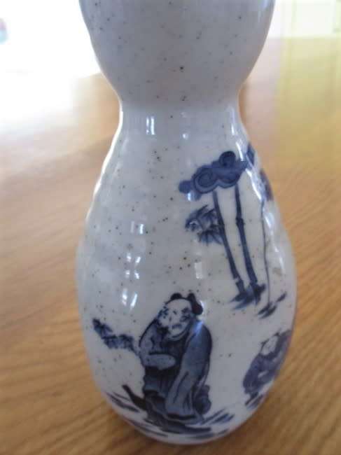 SEVEN PIECE ORIENTAL SAKE SET - SIGNED ON BASE