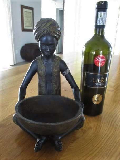 STUNNING LARGE HAND MADE  NUBIAN FIGURE HOLDING BOWL - IDEAL FOR SNACKS OR AFTER-DINNER BON-BONS!
