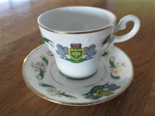 VINTAGE AND HISTORICAL - FORMER HOMELAND VENDA CUP AND SAUCER DEPICTING VENDA COAT OF ARMS