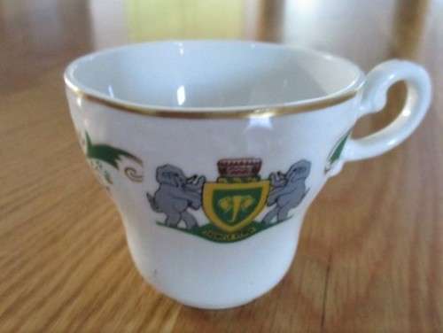VINTAGE AND HISTORICAL - FORMER HOMELAND VENDA CUP AND SAUCER DEPICTING VENDA COAT OF ARMS