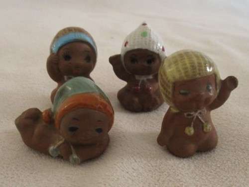 MORE BARGAINS - FOUR TINY VINTAGE CERAMIC KEWPIE DOLLS