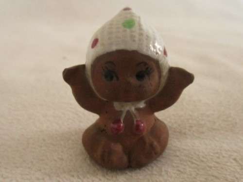 MORE BARGAINS - FOUR TINY VINTAGE CERAMIC KEWPIE DOLLS