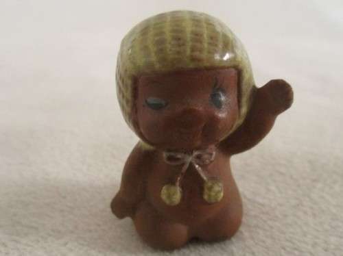 MORE BARGAINS - FOUR TINY VINTAGE CERAMIC KEWPIE DOLLS