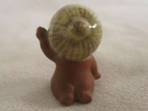 MORE BARGAINS - FOUR TINY VINTAGE CERAMIC KEWPIE DOLLS