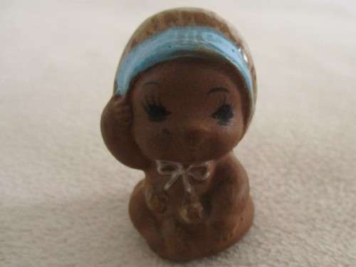 MORE BARGAINS - FOUR TINY VINTAGE CERAMIC KEWPIE DOLLS