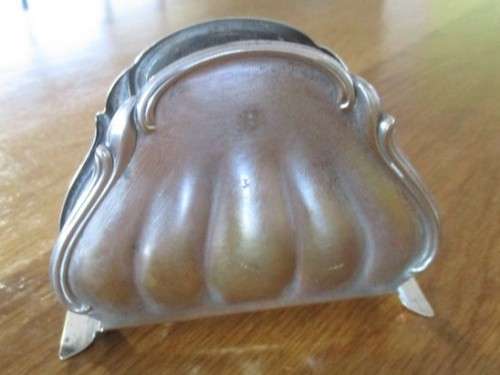 A SMALL VINTAGE SILVER PLATED SERVIETTE HOLDER MADE IN SWEDEN