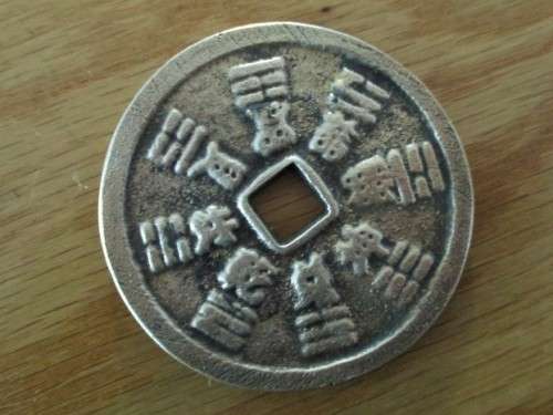 THREE VINTAGE CHINESE? BALINESE? COINS
