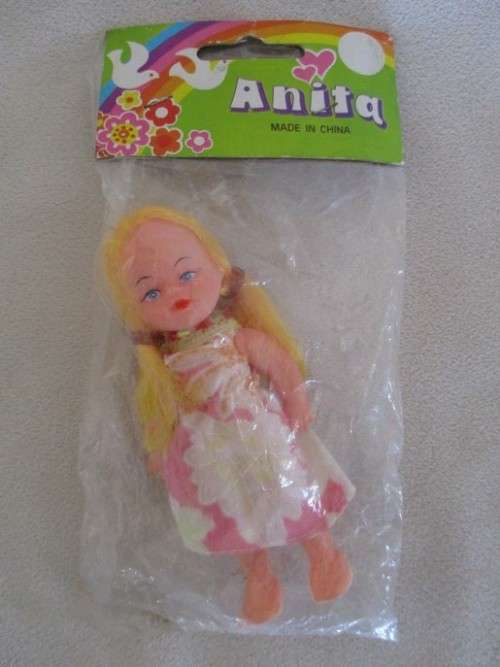 FOUR VINTAGE 1980's DOLLIES STILL SEALED IN ORIGINAL PACKAGING