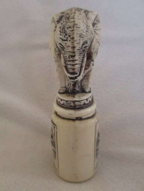 UNUSUAL ELEPHANT-SHAPED PERFUME BOTTLE FOR THE  COLLECTOR