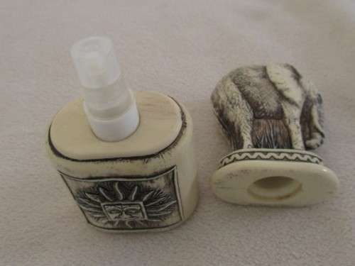 UNUSUAL ELEPHANT-SHAPED PERFUME BOTTLE FOR THE  COLLECTOR