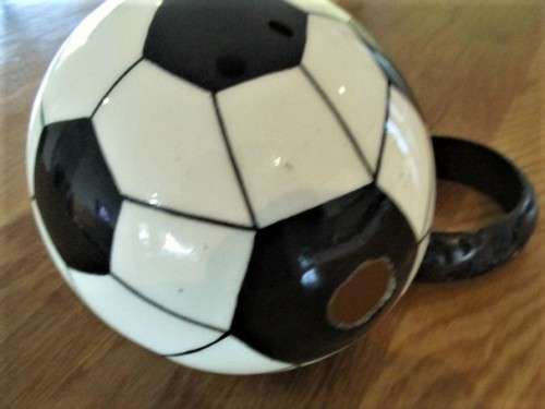 FOR THE SOCCER ENTHUSIAST - A STUNNING PAINTED SOCCER BALL OSTRICH EGG! WITH WOODEN STAND