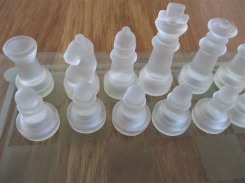 A COMPLETE GLASS CHESS SET WITH ORIGINAL BOX