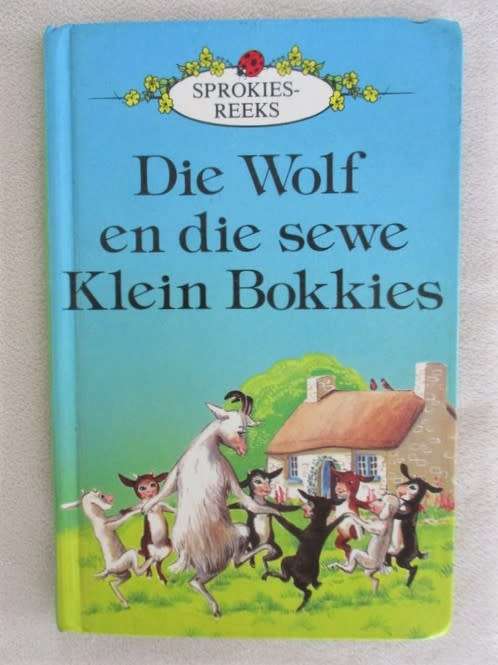 AFRIKAANS LADYBIRD BOEKIE - DIE WOLF EN DIE SEWE KLEIN BOKKIES