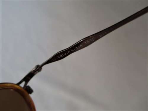 TWO PAIRS OF VINTAGE SUNGLASSES - CALVIN KLEIN AND GIORGIO ARMANI?