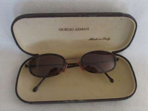 TWO PAIRS OF VINTAGE SUNGLASSES - CALVIN KLEIN AND GIORGIO ARMANI?
