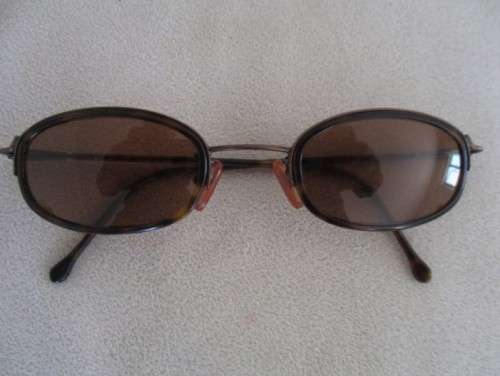TWO PAIRS OF VINTAGE SUNGLASSES - CALVIN KLEIN AND GIORGIO ARMANI?