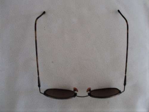 TWO PAIRS OF VINTAGE SUNGLASSES - CALVIN KLEIN AND GIORGIO ARMANI?
