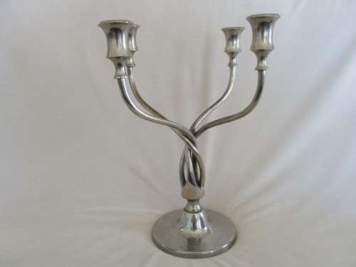 A LARGE CANDLESTICK - 4 CANDLE HOLDER