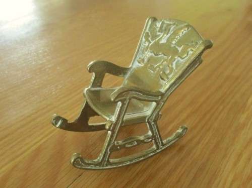 SMALL ORNAMENTAL SOLID BRASS ROCKING CHAIR
