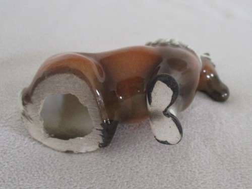 A PRETTY SMALL HORSE ORNAMENT